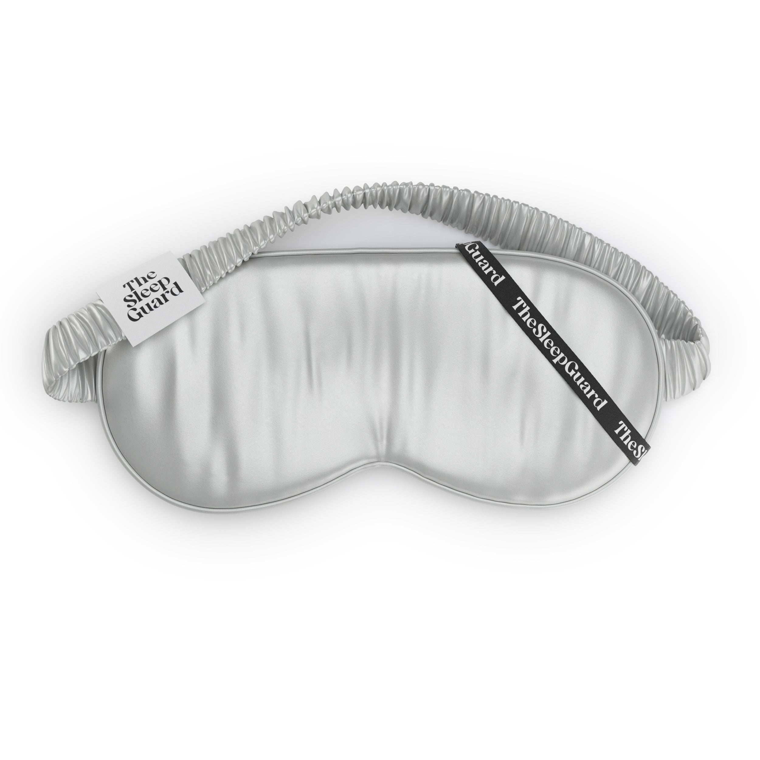 Sleep mask silver grey gray with 'The Sleep Guard' branding on a white background
